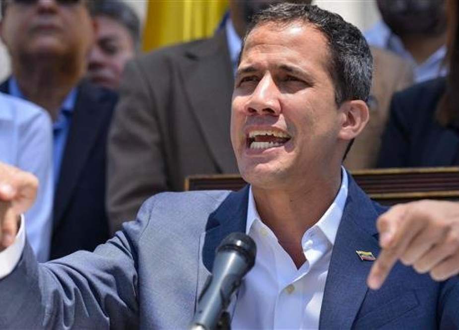 Venezuelan opposition leader and self-proclaimed acting president Juan Guaido speaks during a press conference at the Venezuelan National Assembly in Caracas on March 10, 2019. (AFP)