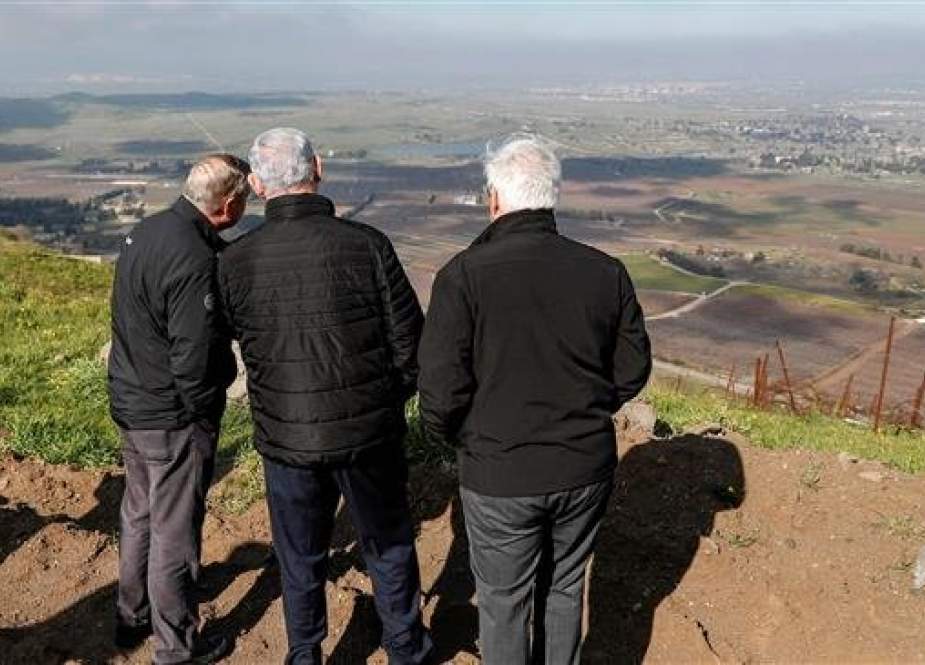 (L to R) US Senator Lindsey Graham (R-SC) is accompanied by Israeli Prime minister Benjamin Netanyahu and US Ambassador to Israel David Friedman as they visit the border line between Syria and the Israeli-occupied Golan Heights on March 11, 2019.