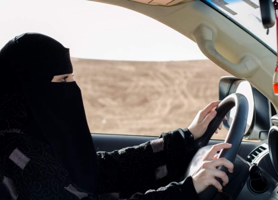 This file image, grabbed from a video uploaded by Saudi activists on YouTube on October 17, 2013, shows a fully-veiled woman driving in Riyadh ahead of a then-planned nationwide day of defiance of the ban on women driving.