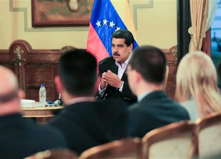 Venezuela’s President Nicolas Maduro attends a meeting at the Miraflores Palace in the capital, Caracas.jpg
