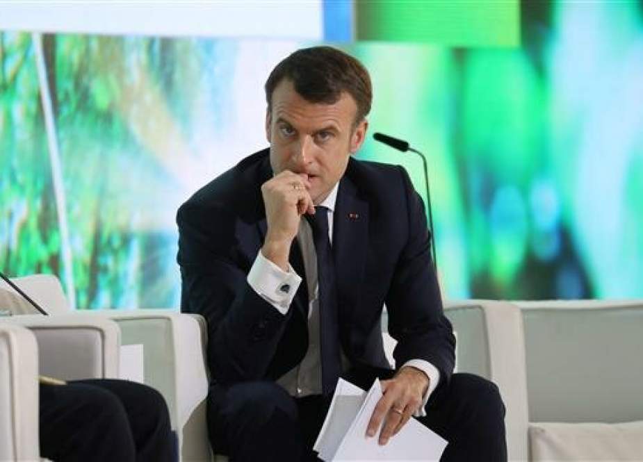 French president Emmanuel Macron looks on during a summit on March 14, 2019, in Nairobi. (Photo by AFP)