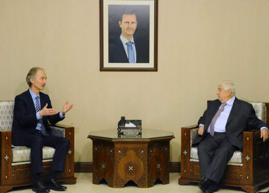 Syrian Foreign Minister and Deputy Prime Minister Walid al-Muallem (R) speaks with United Nations (UN) Special Envoy for Syria Geir Pedersen (L) in Damascus, Syria, on March 17, 2019.