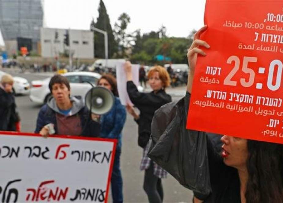 Israeli women take part in a rally against domestic violence in the city of Tel Aviv on December 12, 2018. (Photo by AFP)