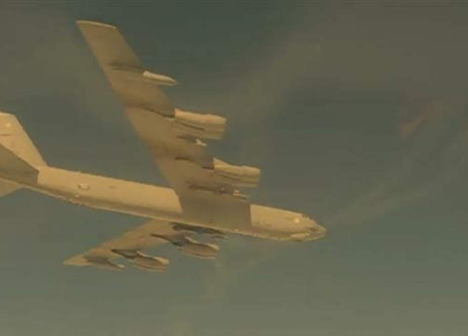 This is an image grab from a Russian Foreign Ministry video showing a US B-52 bomber being chased away by Russian fighter jets over the Baltic Sea.