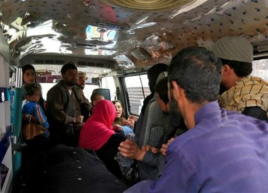 A family reacts inside an ambulance after they lost a member after multiple explosions in Kabul, Afghanistan, on March 21, 2019. (Photo by Reuters)
