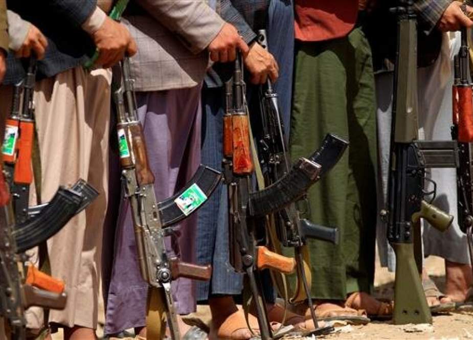 Tribal gunmen loyal to the Houthi Ansarullah movement fighting a Saudi-led war protest with their weapons during a gathering in the capital Sana