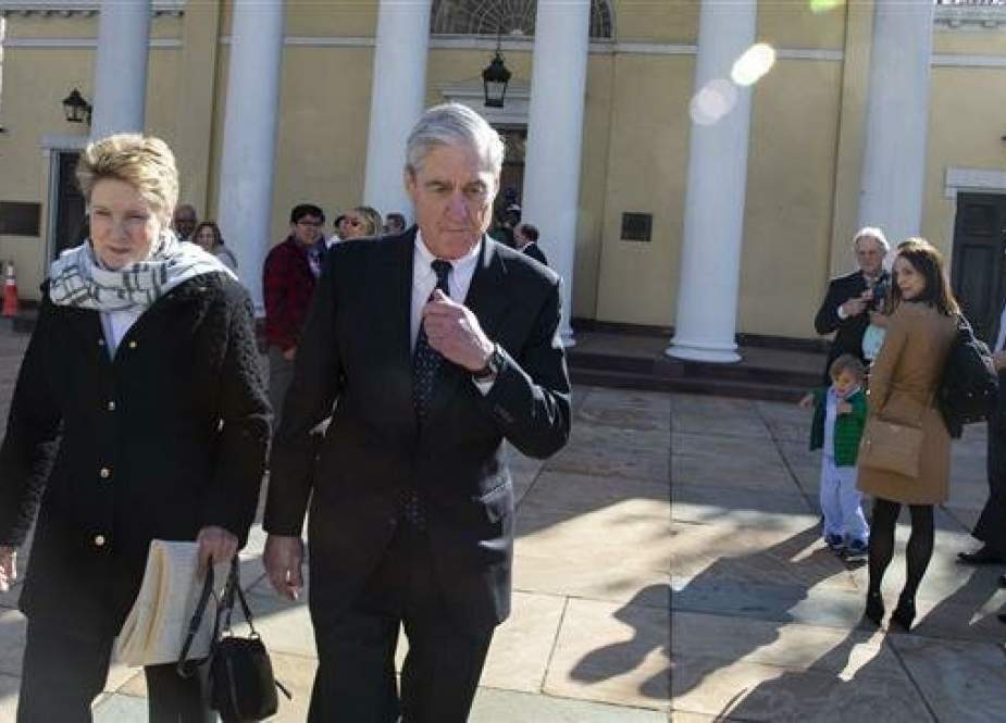 Special counsel Robert Mueller walks with his wife Ann Mueller.jpg