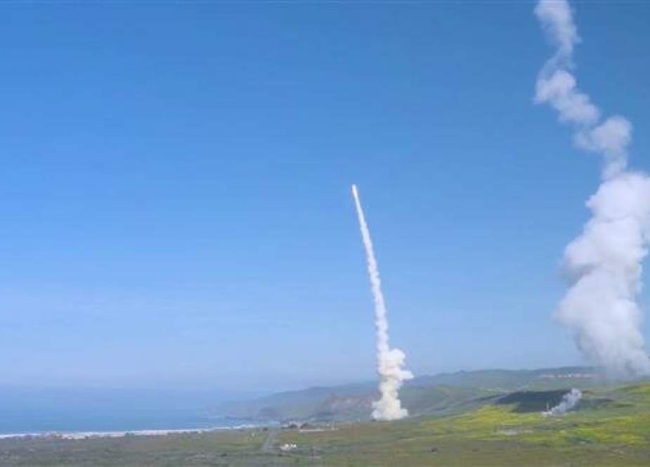 This image grab from a video by the US Missile Defense Agency (MDA) shows two Ground-based Midcourse Defense (GMD) interceptor missiles blasting off to destroy an incoming ICBM-level threat, Vandenberg Air Force Base, California, March 25, 2019.