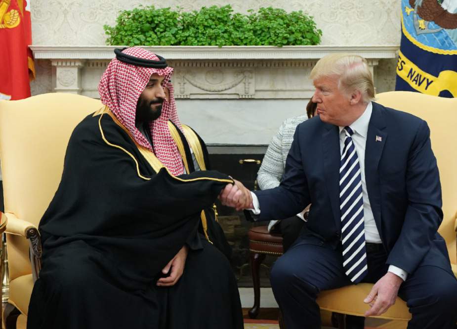 In this file photo taken on March 20, 2018, US President Donald Trump (R) shakes hands with Saudi Crown Prince Mohammed bin Salman. (Photo by AFP)