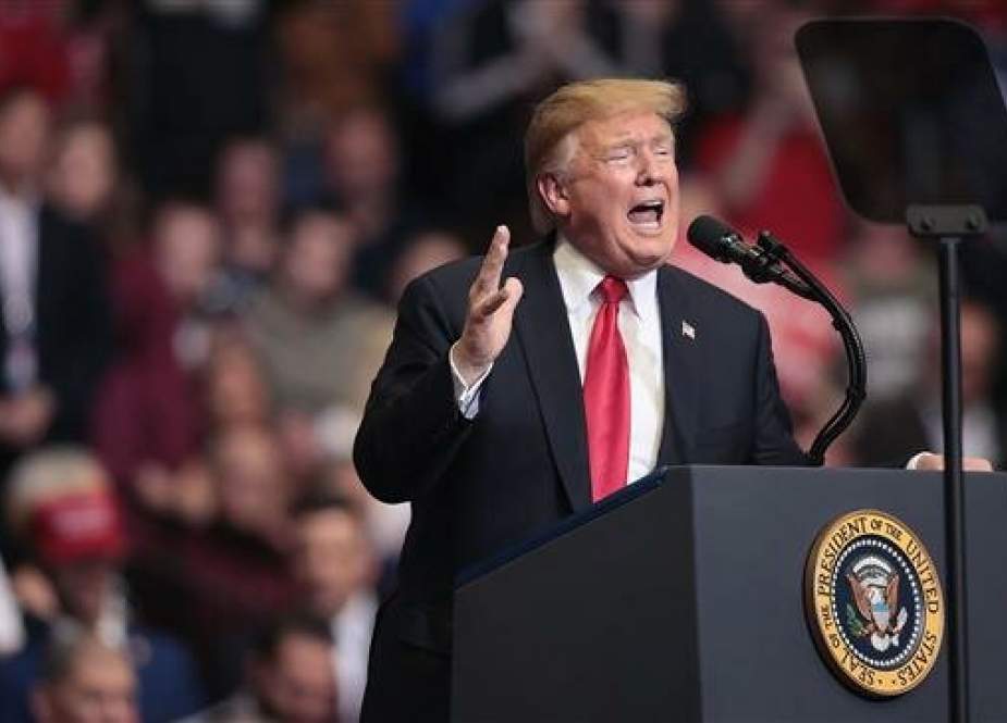 US President Donald Trump speaks to supporters during a rally at the Van Andel Arena on March 28, 2019 in Grand Rapids, Michigan. (Photo by AFP)