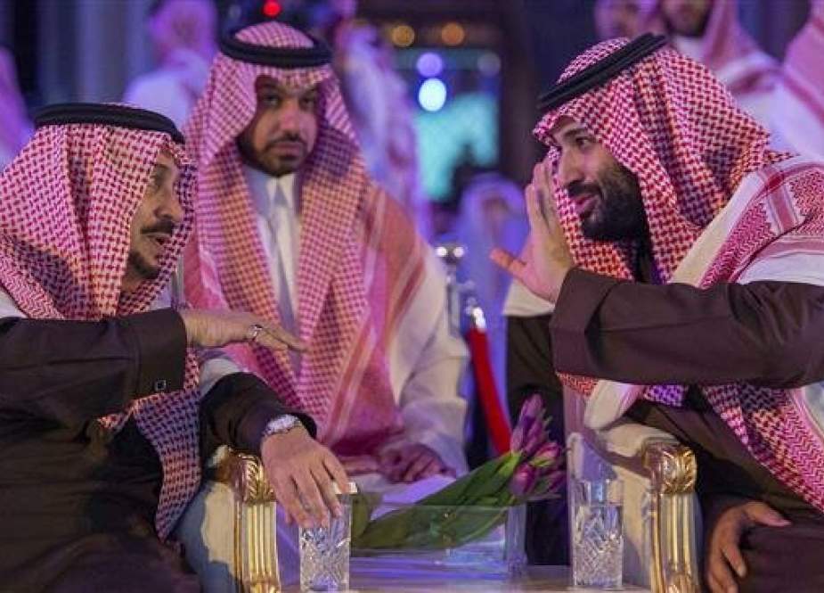 A handout picture provided by the Saudi Press Agency (SPA) on January 28, 2019 shows Crown Prince Mohammed bin Salman (R) speaking to King Salman during a ceremony at a hotel in Riyadh. (Via AFP)