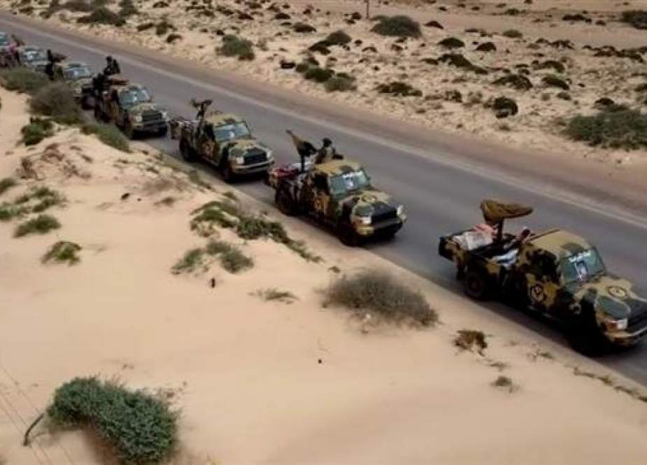 Convoy of armored vehicles carrying forces loyal to Gen. Khalifa Haftar.jpg