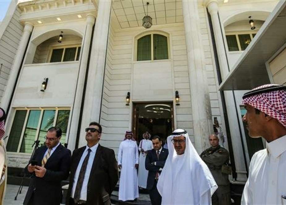 Saudi diplomatic staff are seen during the inauguration of the new Saudi consulate compound in the Iraqi capital Baghdad on April 4, 2019. (Photo by AFP)