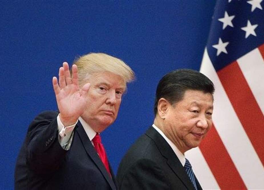 This picture taken on November 9, 2017 shows US President Donald Trump (L) and China