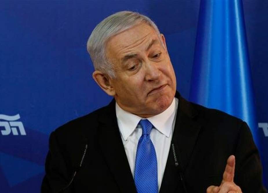 Israeli Prime Minister Benjamin Netanyahu gestures during an elections campaign press conference at his residence in the occupied city of Jerusalem al-Quds, on April 1, 2019. (AFP photo)