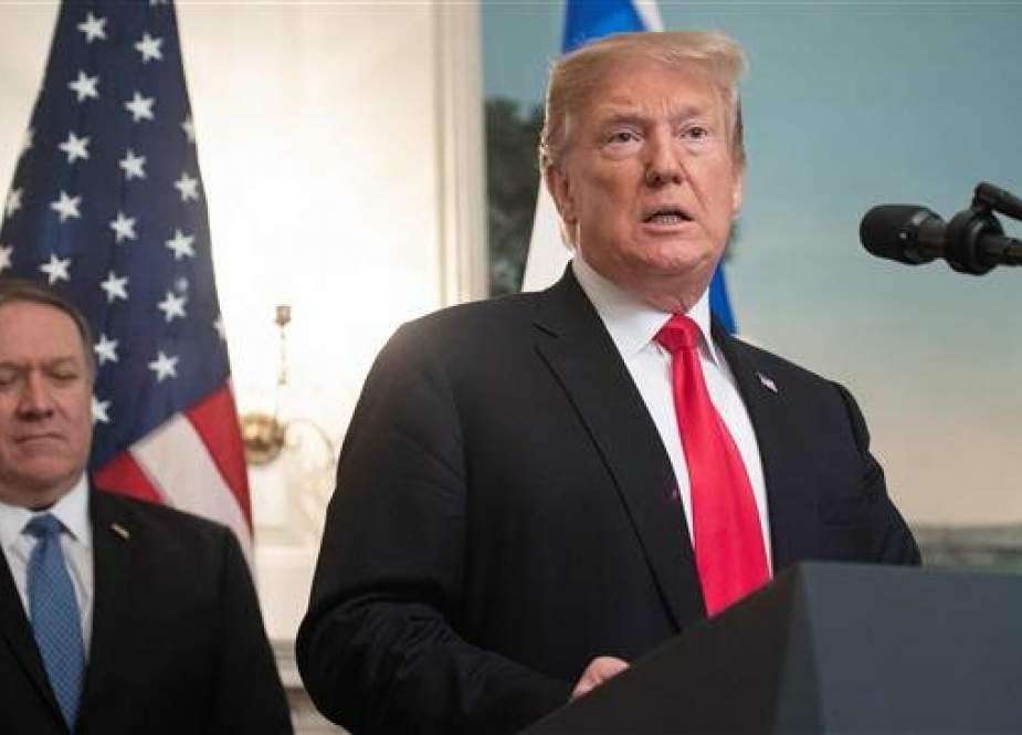 US President Donald Trump speaks alongside US Secretary of State Mike Pompeo (L) prior to signing a Proclamation on the Golan Heights in the Diplomatic Reception Room at the White House in Washington, DC, March 25, 2019, during a visit by Israeli Prime Minister Benjamin Netanyahu. (AFP photo)
