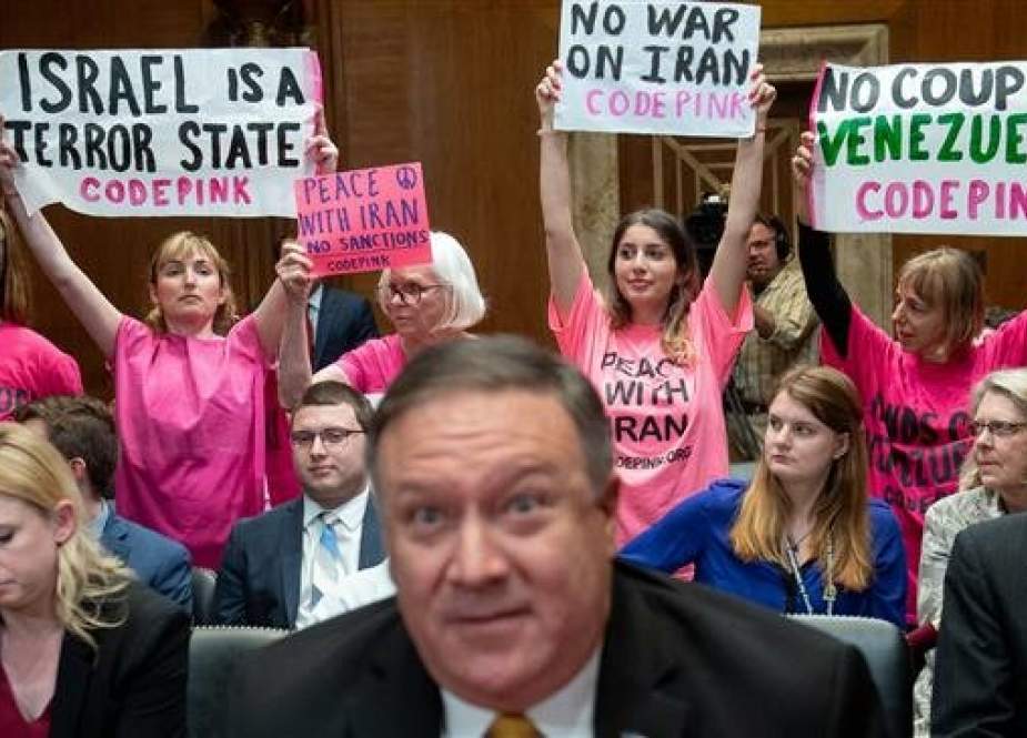 Codepink protesters hold signs as US Secretary of State Mike Pompeo arrives to testify during a Senate Appropriations on State, Foreign Operations and Related Programs Subcommittee hearing on the proposed budget for fiscal year 2020, on Capitol Hill in Washington, DC on April 9, 2019.(AFP photo)
