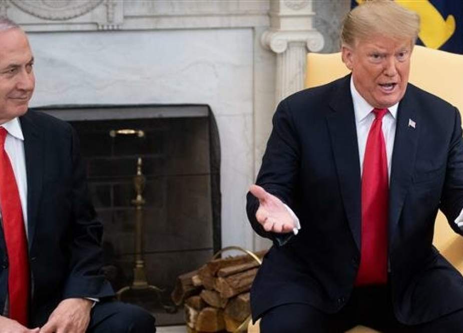 US President Donald Trump, right, and Israeli Prime Minister Benjamin Netanyahu hold a meeting in the Oval Office at the White House in Washington, DC, March 25, 2019. (Photo by AFP)