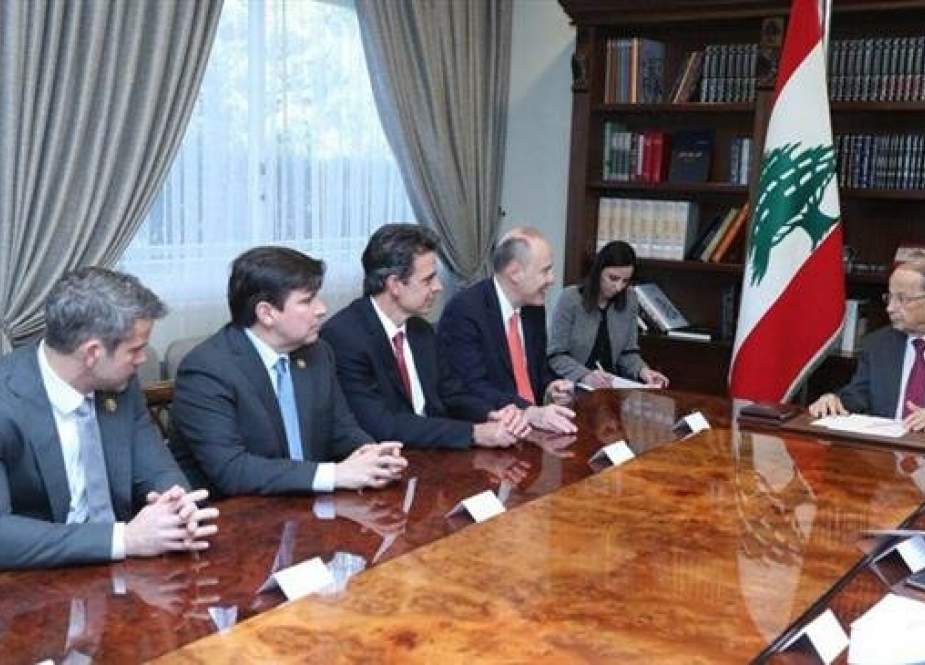 Lebanese President Michel Aoun (R) holds talks with a US congressional delegation at the Presidential Palace in Baabda on April 12, 2019. (Photo by Lebanese Broadcasting Corporation International (LBCI) TV network)