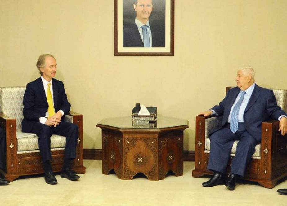 A handout picture released by the official Syrian Arab News Agency (SANA) on April 14, 2019 shows Syrian Foreign Minister and Deputy Prime Minister Walid al-Muallem (R) meeting with United Nations Special Envoy to Syria Geir Pedersen in the Syrian capital Damascus.