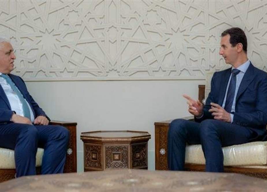 Syrian President Bashar al-Assad (R) meets with Iraqi National Security Adviser Faleh al-Fayad in Damascus, Syria, on April 14, 2019. (Photo by SANA)