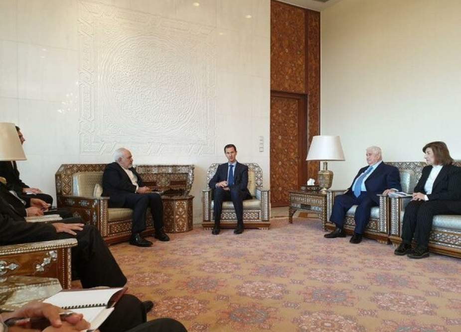 Syrian President Bashar al-Assad with Iranian Foreign Minister Mohammad Javad Zarif in Damascus.jpg