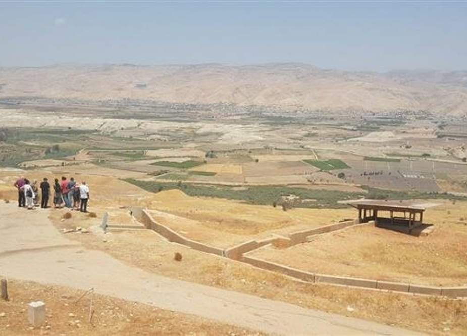 In this file picture, potential Israeli settlers get a tour of the site of a Jordan Valley outpost. (Photo by English-language Haaretz daily newspaper)