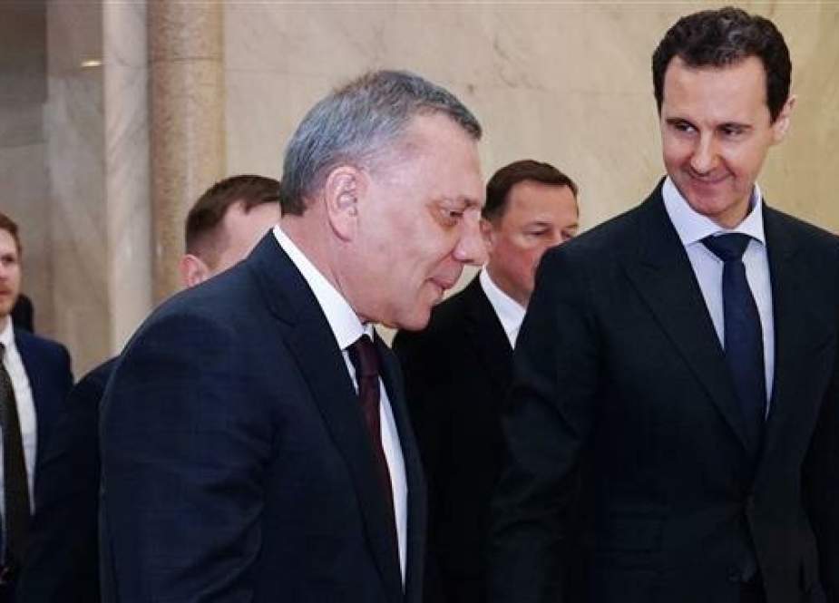 This handout picture released by the official Syrian Arab News Agency (SANA) on April 20, 2019 shows President Bashar al-Assad (R) receiving Russian Deputy Prime Minister Yuri Borisov in the Syrian capital Damascus.