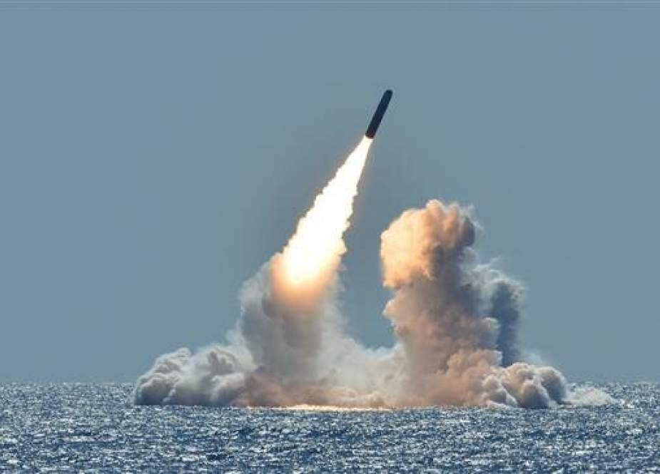 An unarmed Trident II D5 missile launches from the ballistic missile submarine USS Nebraska in the Pacific Ocean off the coast of California, March 26, 2018, as part of a US Navy Strategic Systems Programs test. (Photo by US military)
