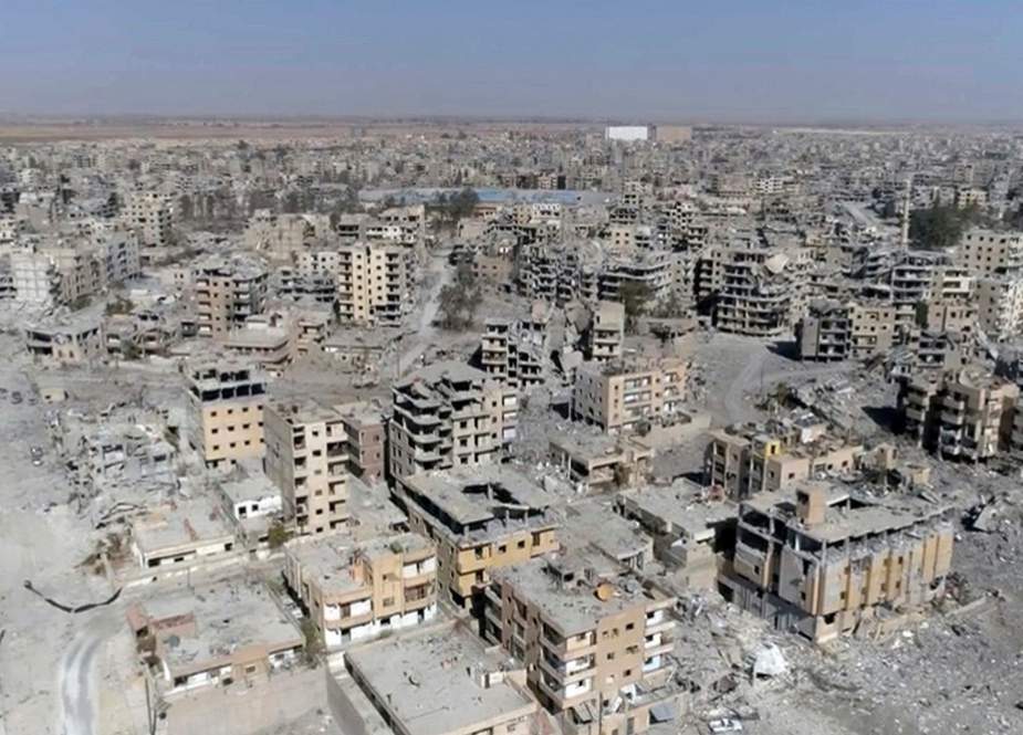 This Oct. 19, 2017, file photo, a frame grab made from drone video shows damaged buildings in Raqqa, Syria. (Photo by AP)
