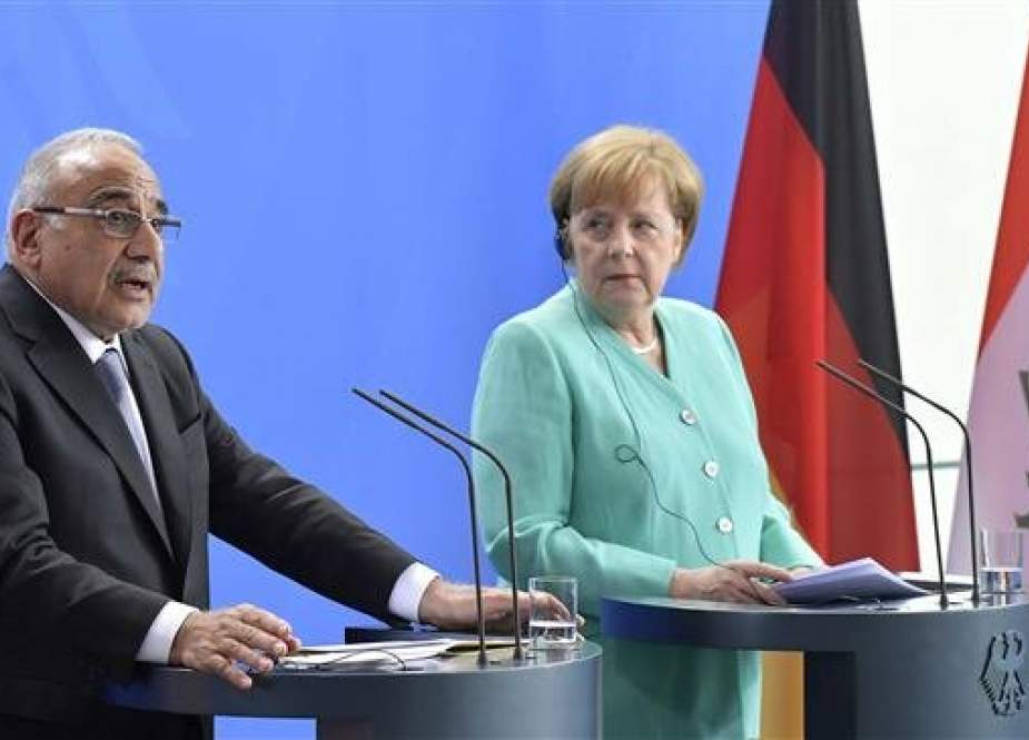 German Chancellor Angela Merkel (R) and Iraqi Prime Minister Adel Abdul Mahdi give a press conference at the Chancellery in Berlin, Germany, on April 30, 2019. (Photo by AFP)