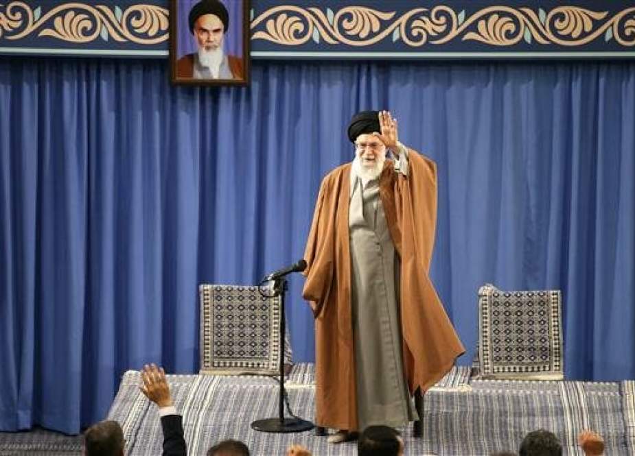 Leader of the Islamic Revolution Ayatollah Seyyed Ali Khamenei waves at a group of teachers during a meeting in Tehran on May 1, 2019. (Photo by leader.ir)