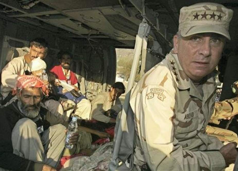 US General John Abizaid, commander of the US Central Command, sits aboard his helicopter about to leave Muzaffarabad, capital of Pakistan-administered Kashmir in this file photo by Reuters.