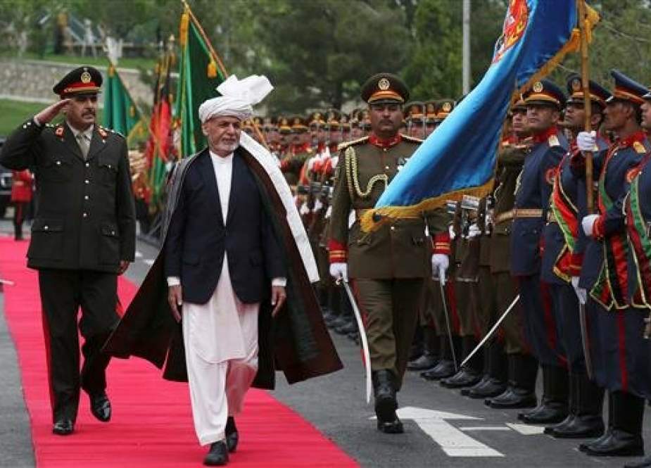 Afghan President Ashraf Ghani inspects an honor guard during the first day of the Loya Jirga in the capital Kabul on April 29, 2019. (Photo by Reuters)