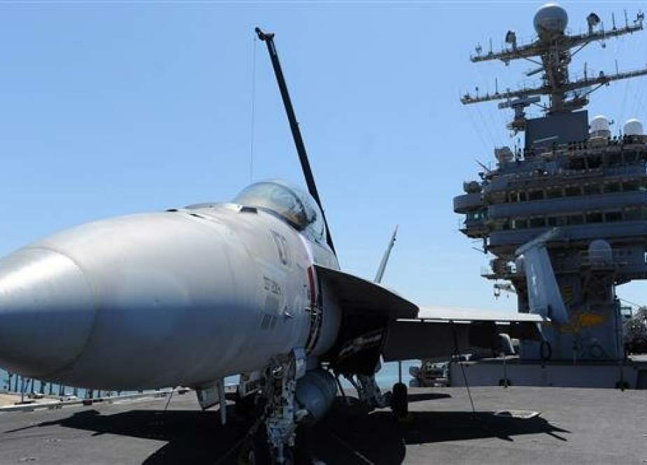 A Boeing FA18 Superhornet on the flight deck of the USS Abraham Lincoln in July 2011. (Photo by AP)