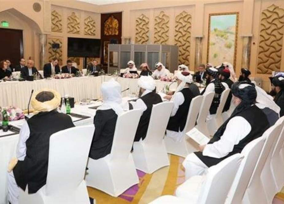 This undated handout picture shows a round of talks between US, Taliban and Qatari representatives in Doha, Qatar. (By Reuters)