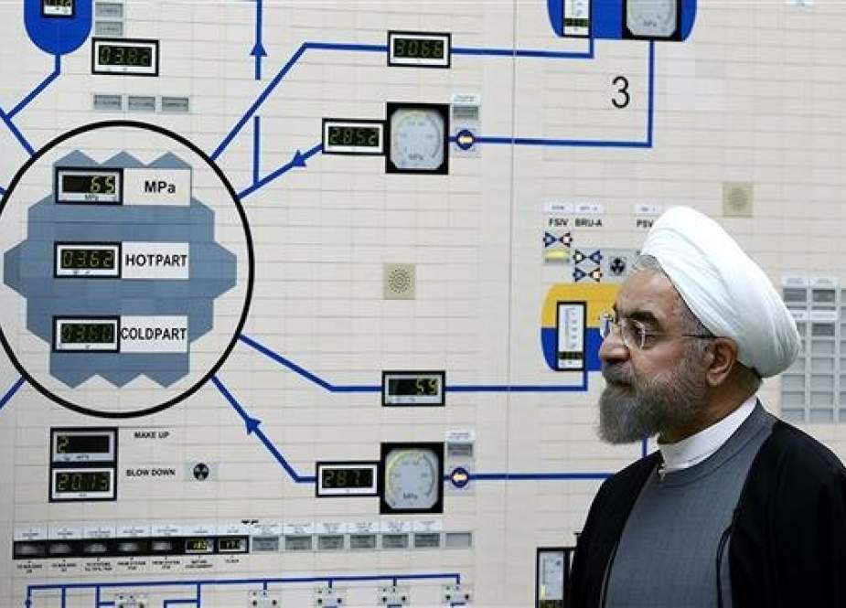 This file handout photo taken on January 13, 2015 from the official website of the Iranian President Hassan Rouhani, shows him visiting the control room of the Bushehr nuclear power plant in the Persian Gulf port city of Bushehr. (AFP photo)