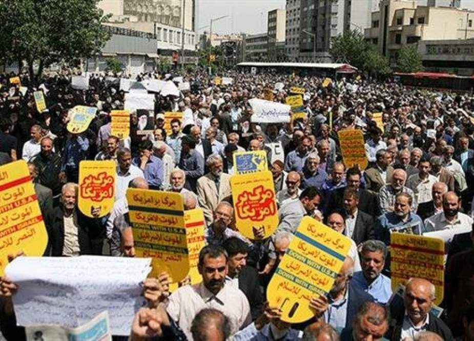 Iranians in the Iranian capital of Tehran participate in nationwide rallies supporting the Iranian government