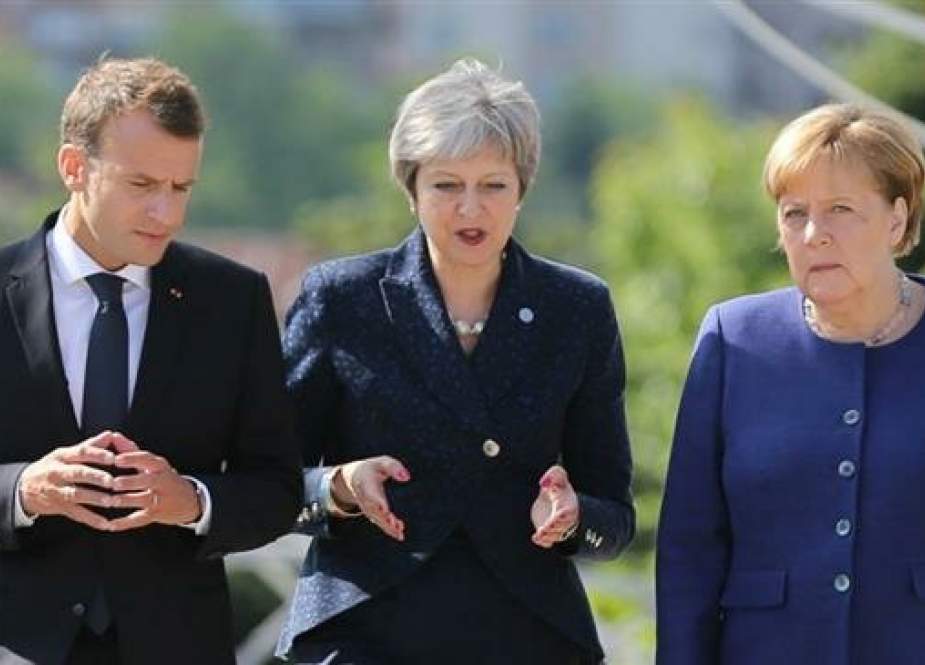 French President Emmanuel Macron, British Prime Minister Theresa May and German Chancellor Angela Merkel..jpg