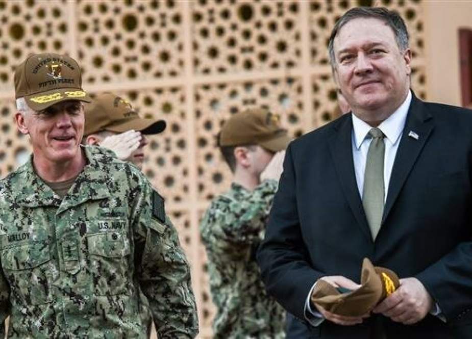 US Secretary of State Mike Pompeo walks with Vice Admiral James Malloy (L), commander of the US Naval Forces Central Command (NAVCENT)/5th Fleet, after a tour of the US Naval Forces Central Command center in Manama on January 11, 2019.