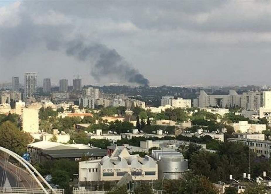 The photo, obtained from Israeli social media, purportedly shows a column of smoke billowing at the Tel HaShomer military base in Tel Aviv, on May 17, 2019.