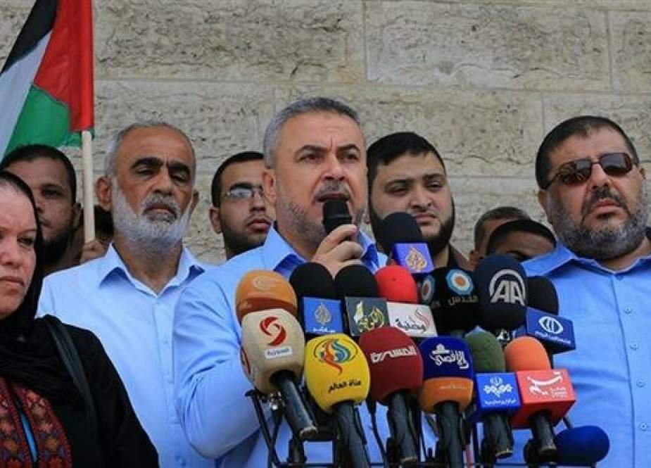 The undated photo shows Ismail Radwan, center, a senior member of the Palestinian resistance movement Hamas.