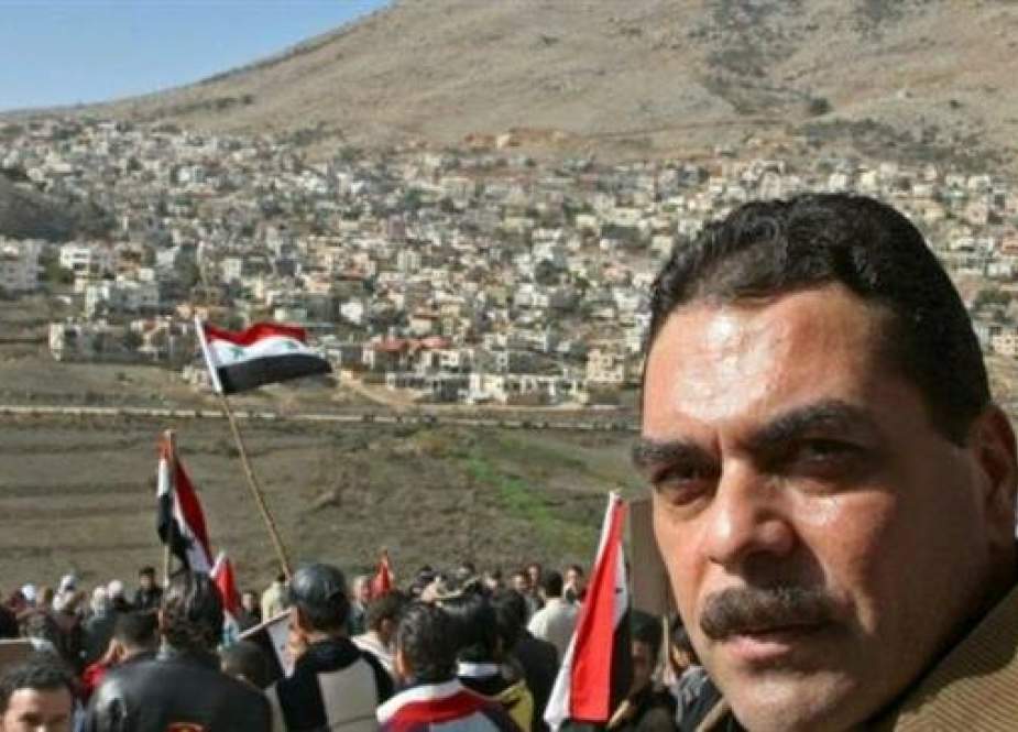 Samir Kuntar attends a rally at Ayn al-Tineh village on the Syrian side in Syria