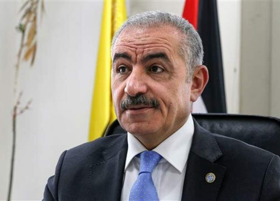 Palestinian Prime Minister Mohammad Shtayyeh speaks at his office in the occupied West Bank city of Ramallah on March 10, 2019. (Photo by AFP)
