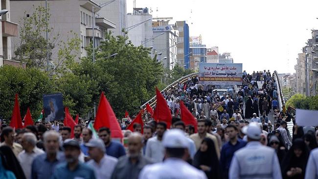 Iranians mark the International Quds Day in capital Tehran on May 31, 2019