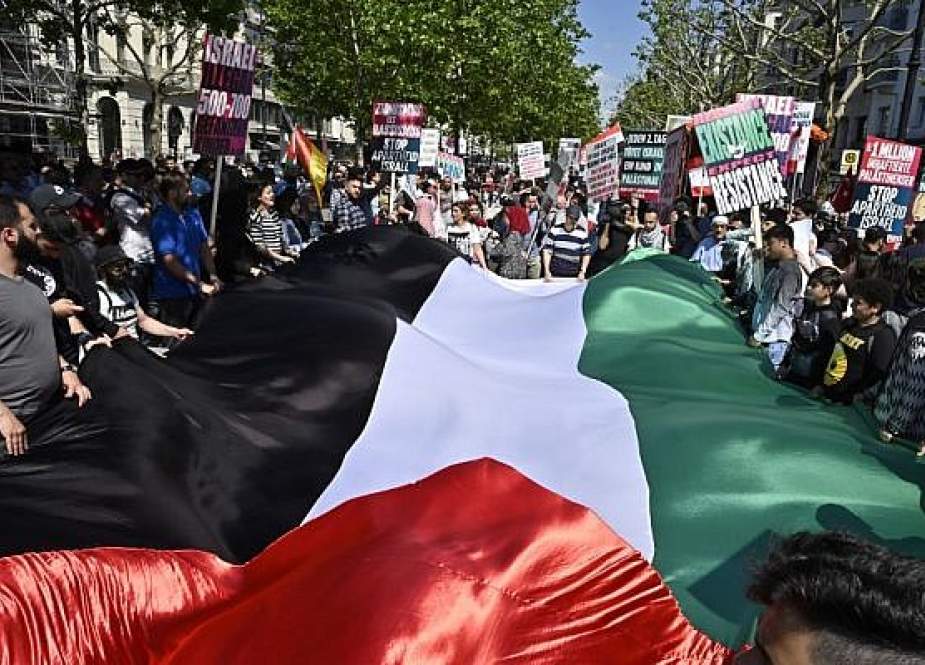People attend a march marking al-Quds International Day in Berlin on June 1, 2019. (Photo by AFP)