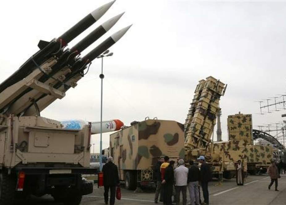 Iranians visit an exhibition of weaponry and military equipment in the capital, Tehran, on February 2, 2019. (Photo by AFP)