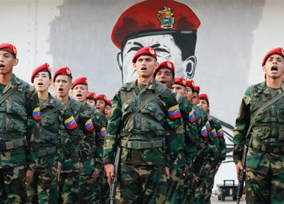 The handout picture released by the Venezuelan presidency shows Venezuelan troops during a military ceremony in Caracas on February 4, 2019. (Photo via AFP)