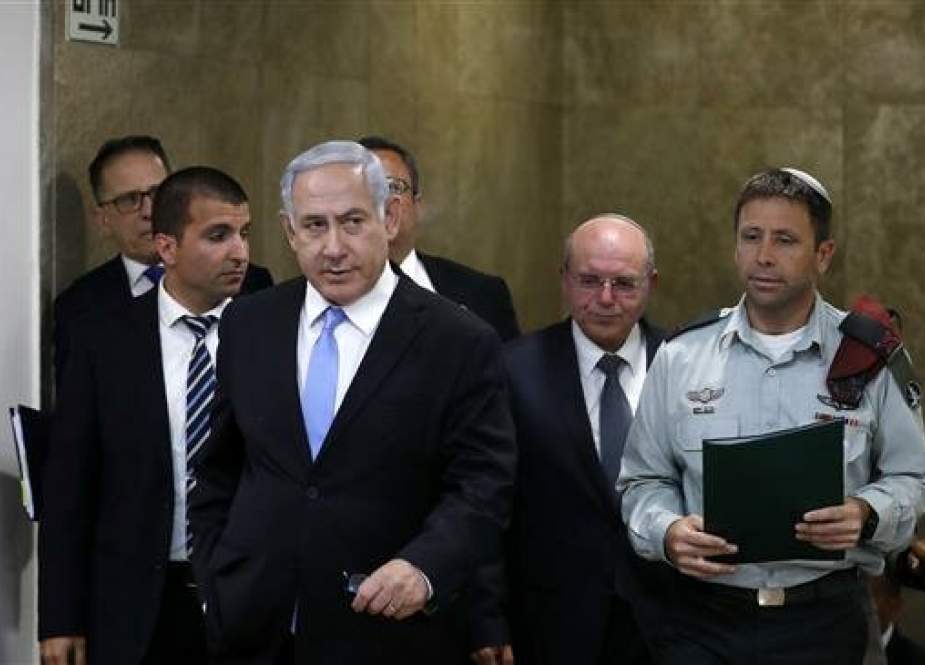 Israeli Prime Minister Benjamin Netanyahu (C) arrives at a weekly cabinet meeting in Jerusalem al-Quds on June 2, 2019. (By AFP)