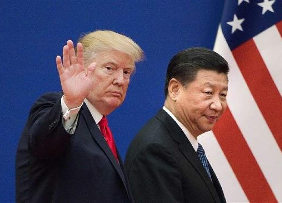 This picture taken on November 9, 2017 shows US President Donald Trump (L) and China